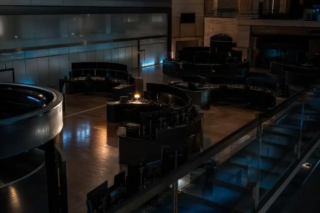 MicroStrategy Q3 Earnings: Record $21B Profit, but Bitcoin Per Share Falls 9 Empty trading floor at night lit by a single desk lamp, reflecting after-hours trading in MSTR