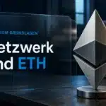Ethereum einfach erklärt: Ethereum-Skulptur aus Metall neben Computerhardware
