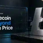 Litecoin investment concept with a brushed-metal Litecoin symbol on a laboratory examination bench