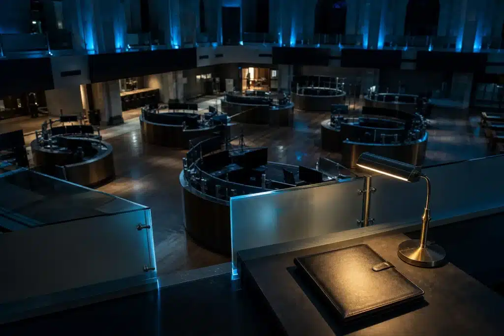 Bitcoin ETF Inflows of $137M Push October Back Into the Green 8 Empty trading floor at night with a single lit desk, evoking quiet ETF fund flows