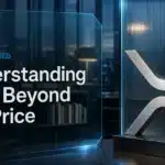 A metal XRP symbol in a research office illustrates an XRP explainer.